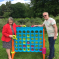Fiona Bruce and Glen Williams with a giant connect 4 garden game